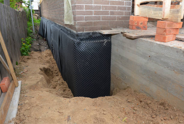 SJ Waterproofing Pros technician performing targeted Foundation Crack Repair assessment in Cumming, GA